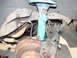 1992 Ford Taurus - This image shows a close-up view of a vehicle's brake system components, including the rotor and caliper.