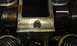1991 Ford Festiva - Engine part detail showing wear and oil, not a 1991 Ford Festiva.