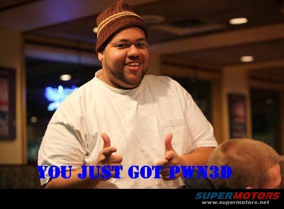 Man wearing a beanie and glasses points forward, with blue text overlay reading "YOU JUST GOT PWN3D"