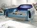 1973 Ford Ranchero - The bed of a blue 1973 Ford Ranchero is shown with tools and supplies, suggesting it is undergoing restoration or repair.