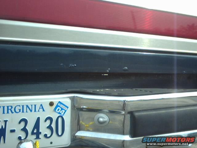 Rear bumper with Virginia license plate W-3430 and 2004 sticker