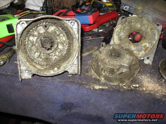 Disassembled gear housing with internal cogs and external casing