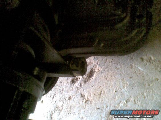 Undercarriage part with bolt on concrete floor