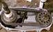 1994 Ford F-250 - Close-up of a vehicle's transfer case interior, showing the chain and sprockets.