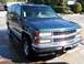 1995 Chevrolet Tahoe - Front view of a teal 1995 Chevrolet Tahoe parked on a driveway.