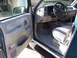1995 Chevrolet Tahoe - The interior of a 1995 Chevrolet Tahoe is visible, the dashboard, steering wheel, and driver's seat.