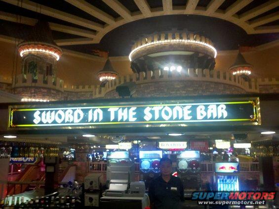 Interior of the Sword in the Stone Bar with a bartender and drink dispensers