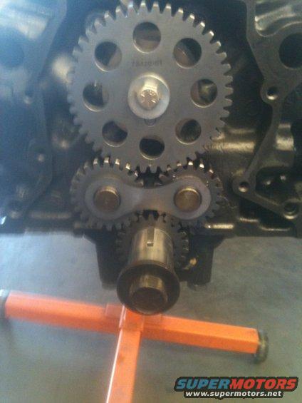 Engine timing gears with visible text '18A20-61'