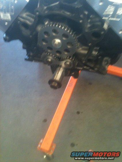 Engine timing gears and crankshaft pulley on an engine stand