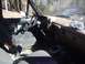 1989 Ford Bronco - Interior view of a 1989 Ford Bronco, showing worn seats and dashboard details.
