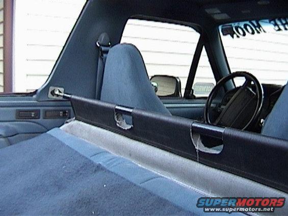Interior view showing blue seats and steering wheel