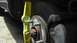 2007 Dodge Caliber - A yellow Stabila level is used to check the brake rotor on a vehicle.