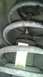 2007 Dodge Caliber - A close-up view of a car's suspension system, showing a yellow tag with part number information.
