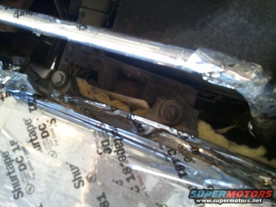 20110727-18.15.54.jpg The bottom of the box is wrapped in insulation, and here you can see the room for the bolt holes.
