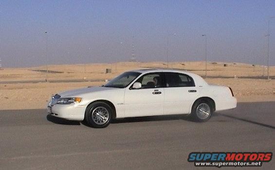 my-town-car-02.jpg powerbraking, you can see the chrome trim is painted (Town Car Touring style)