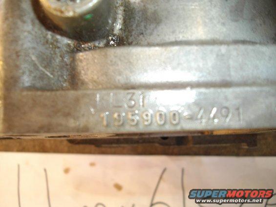 Close-up of a metal part with stamped numbers '1L31' and '195900-4491'