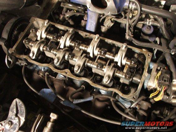 Engine valve train with camshafts and rockers exposed
