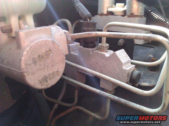 Brake master cylinder with part numbers 51062 and 7888 stamped on it