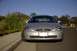 1998 Ford Taurus - A silver 1998 Ford Taurus is parked curbside on a sunny day.