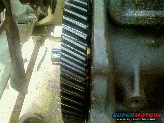 073011121500.jpg Found the source of my engine knocking.  The bolts that held the cam thrust plate in place had come loose and the cam could move back and forth.  