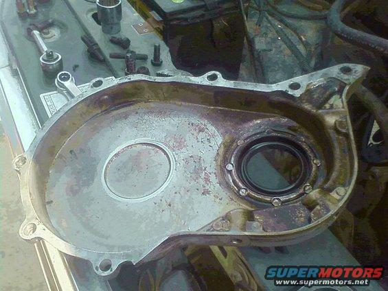 073011122900.jpg The only thing holding the cam in the engine was the timing cover.  Can see the worn shiny spot in the center where the cam gear was rubbing against it.