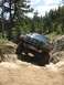 1995 Ford Bronco - This 1995 Ford Bronco is shown tackling a challenging off-road course.