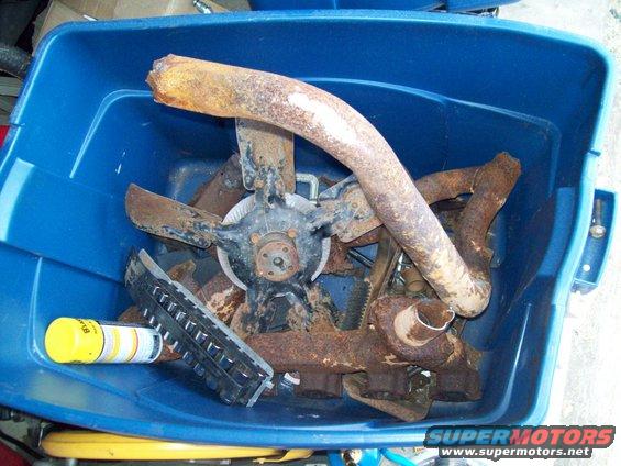 85-box-o-parts.jpg Box o parts, stock exhaust manifolds and clutch fan from a guy parting out an 86 f250