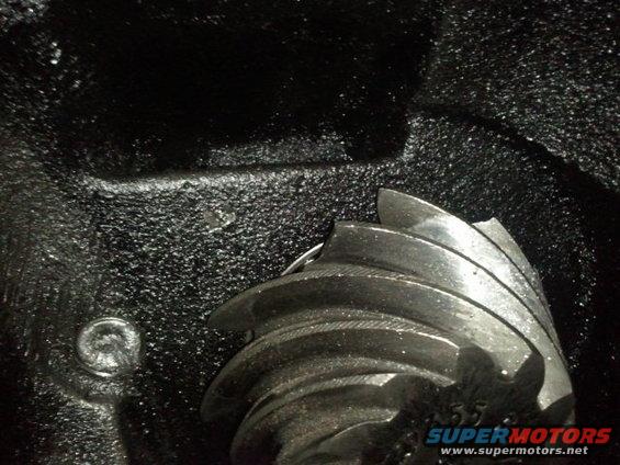 Close-up of a differential gear with '55' visible on it