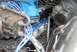 1976 Ford Ranchero - A detailed view of an engine compartment, focusing on various mechanical parts and wiring.
