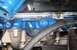 1976 Ford Ranchero - Close-up of an engine component, possibly a spark plug, with blue paint and a SuperMotors.net watermark visible.