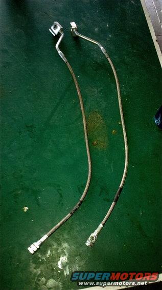 Two braided metal brake lines with fittings