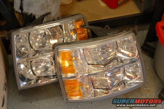 Two aftermarket headlights for a 2007 Chevrolet Silverado 1500