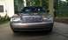2007 Ford Crown Victoria - The front grille and headlights of a gray 2007 Ford Crown Victoria are visible in this front-facing shot.