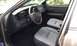 2007 Ford Crown Victoria - The interior of a 2007 Ford Crown Victoria is captured, highlighting the driver's side controls and seating arrangement.