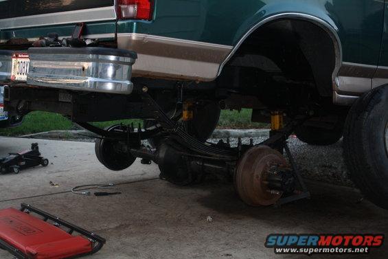 1996 Ford Bronco rear axle and suspension being worked on