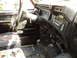 1986 Ford Bronco - Interior view of a truck, likely from the 1980s, with a focus on the dashboard and driver's side.