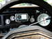 1986 Ford Bronco - The dashboard features several aftermarket gauges and a GPS unit, indicating a customized interior.
