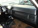 1986 Ford Bronco - Interior view of a 1986 Ford Bronco dashboard, showing gauges, radio, and shifter.