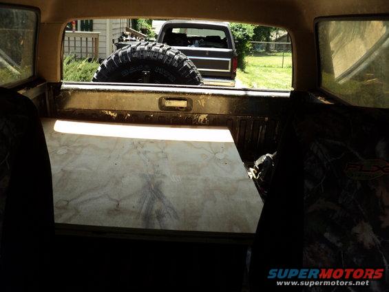 1986 Ford Bronco rear view with spare tire in bed