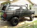 1986 Ford Bronco - This lifted black Ford Bronco appears to be from the early 1980s, not a 1986 model.