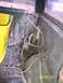 1978 Ford Bronco - The interior of a vehicle shows a yellow bucket and exposed wiring, with a date stamp of 08/09/2011.