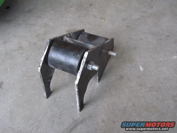 Custom suspension part with rubber bushings and metal brackets