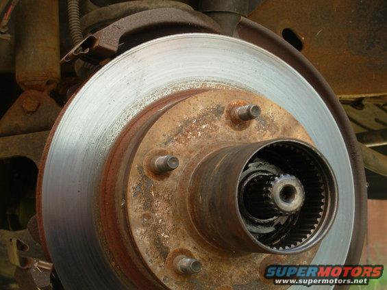 oj14rotorrhf.jpg Floating caliper; 5-screw auto locks; old-style wheel bearing nuts.

[url=http://www.supermotors.net/vehicles/registry/media/881338][img]http://www.supermotors.net/getfile/881338/thumbnail/oj09frontaxle.jpg[/img][/url]