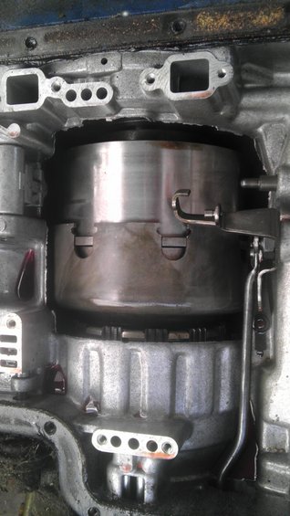 Close-up of automatic transmission internals, showing torque converter and clutch pack