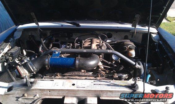 1992 Ford Ranger engine bay with aftermarket intake piping