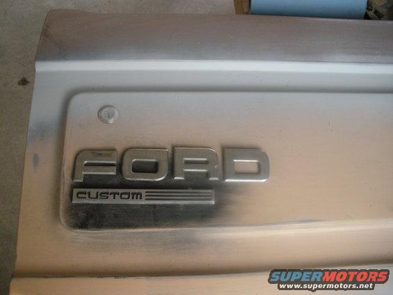 decided to customize the rear trim... from the factory it just had a blue oval. these are letters from the tailgate of an f150