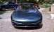 1997 Ford Probe - Front view of a 1997 Ford Probe, parked outdoors with other vehicles visible.
