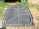 1979 Ford Ranchero - The underside of a black tonneau cover, showing its reinforced grid structure and hinges.