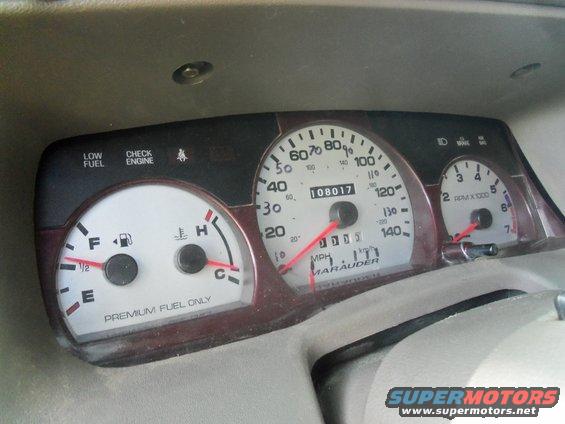 Interior dashboard gauges with 'Marauder' label visible