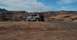 1990 Ford Bronco - Shawn crests a climb with an incredible background